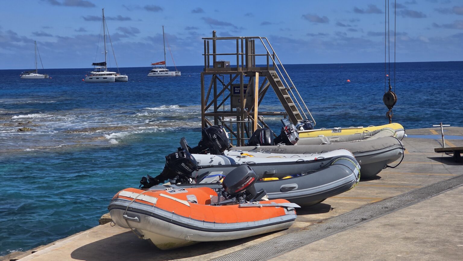 Niue dinghy parking lot is busy