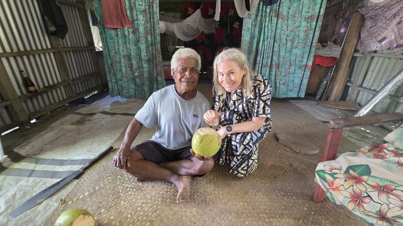Once you are welcomed to the village you are assigned a host. Our host is lovely Tai who first shares with us coconuts in his house. The straws are made from little papaya branches